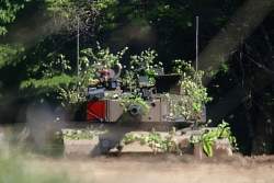 311074 B